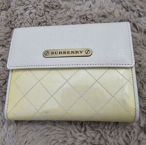 Burberry Kisslock Trifold Wallet.